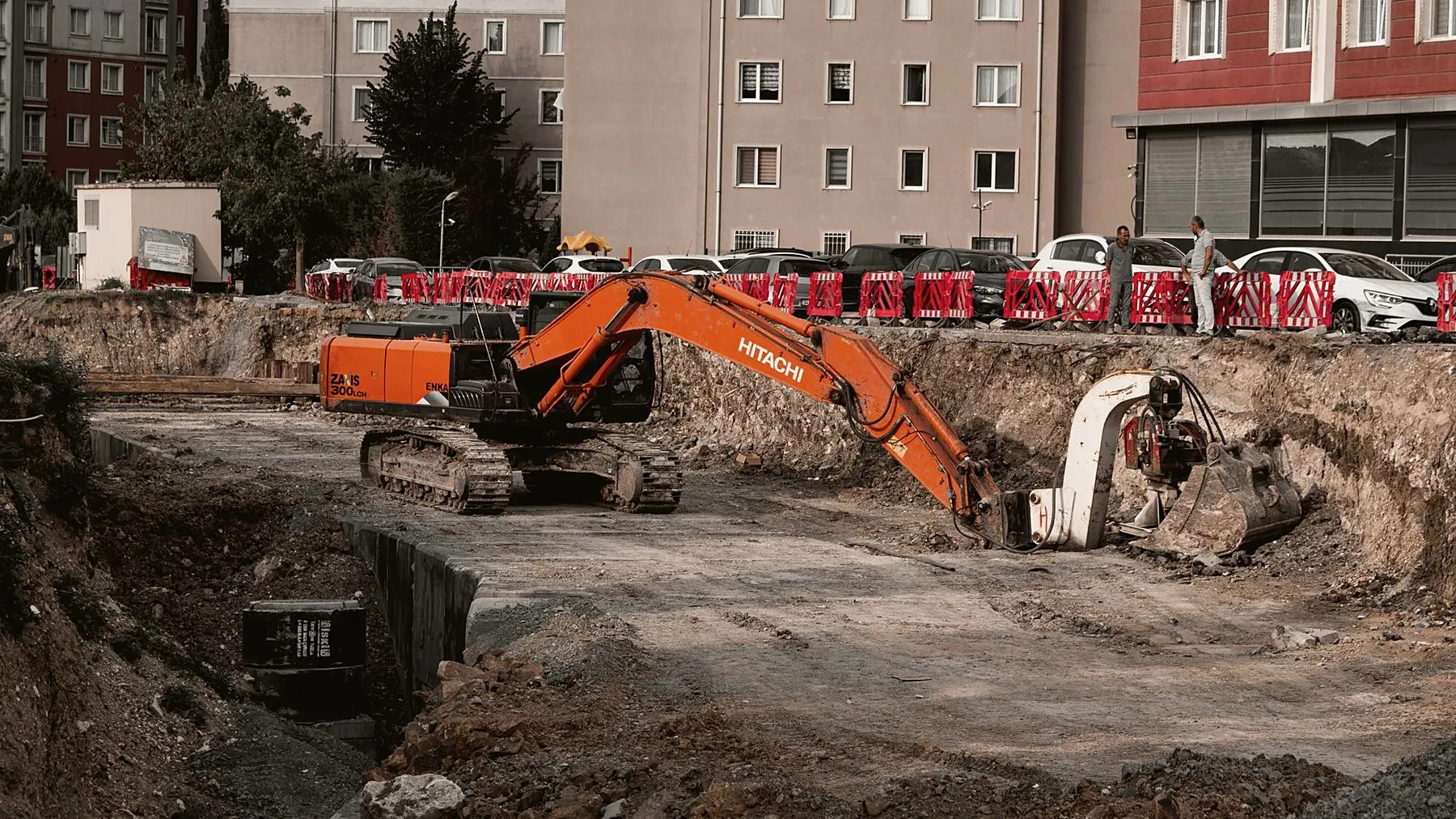 Excavators working an urban site